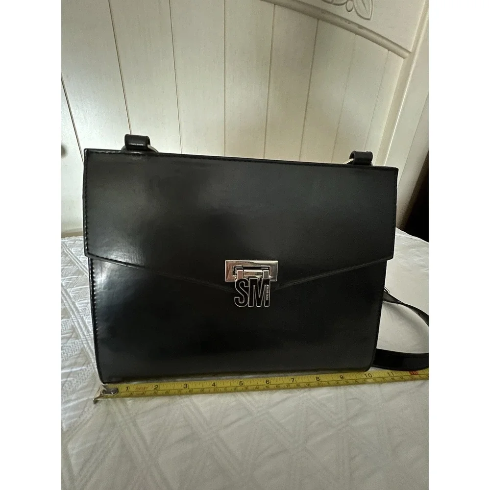 Steve Madden bag, sizes 10 × 8 with adjustable‎ strap,,black